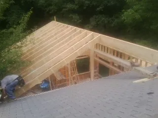 Framing a new roof addition that ties into an existing shingle roof in Saint Marks
